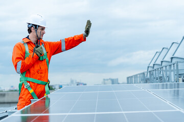 Professional technician worker or engineer stand near solar cell panel during check or maintenance...