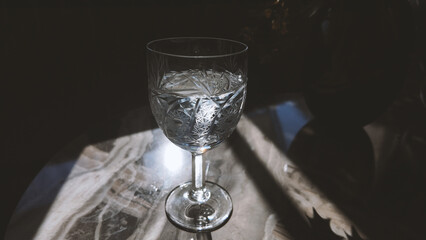 A glass of water on a table 