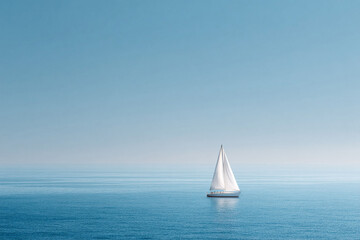 Obraz premium Serene seascape featuring a white sailboat gliding across calm, blue waters under a clear sky. Evokes peace, freedom, journey. Ideal for travel, lifestyle, and motivational themes.