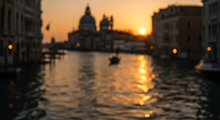A gondola sails along a canal in Venice at sunset, with the sun reflecting on the water.