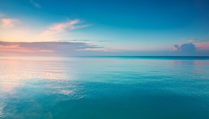 Obraz premium calm water surface reflects soft pastel hues creating serene at