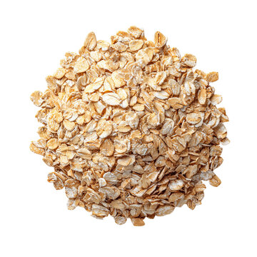 Oatmeal flakes: An overhead view of uncooked oatmeal flakes, their light tan color forming a nutritious and versatile base for breakfast.
