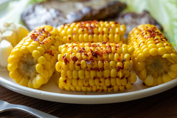 Close-up of corn with sauce and spices