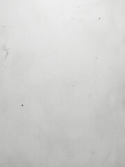 Fototapeta premium Subtle texture in a monochrome white gradient with imperfections and faint marks creating an interesting background for overlays
