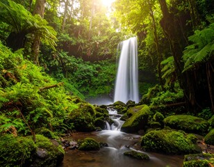 Serene Waterfall Surrounded by Lush Greenery and Mist in a Vibrant Forest Setting at Sunrise