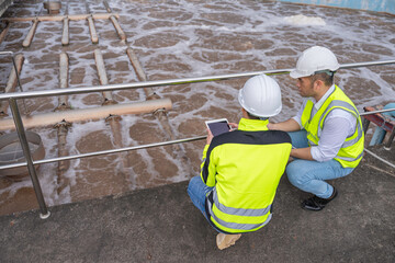 Environmental engineers work at wastewater treatment plants,Water supply engineering working at...