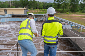 Environmental engineers work at wastewater treatment plants,Water supply engineering working at...