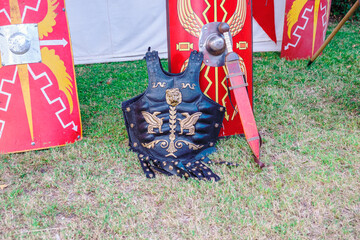 Ornate Roman Cuirass and Sword with Scutum Shields