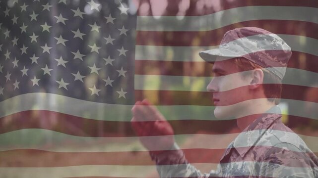 After command Air Force soldier raising hand saluting waving flag for military training - Powered by Adobe