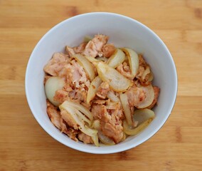 Asian spicy dish with chicken, pepper, fried onions