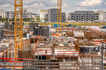 Construction Site In Freiham Munich Bavaria: Large Building Foundation With Concrete Structures,...