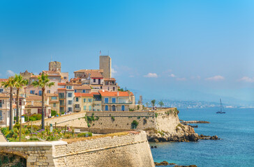 picturesque view of the old town of Antibes and the blue Mediterranean Sea
