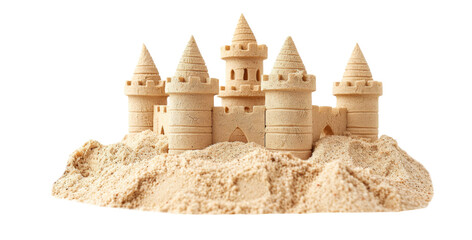 Sandcastle built with intricate towers and surrounding seashells demonstrates creativity at the beach during sunny summer day