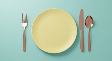 A flat lay of a pastel yellow plate with rose gold cutlery The setting is placed on a solid light teal background