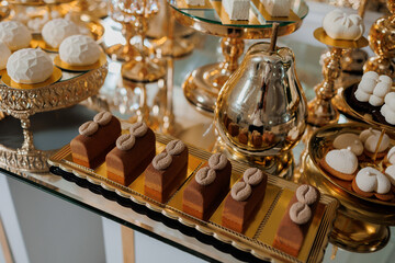 Elegant dessert display featuring assorted treats at a lavish celebration