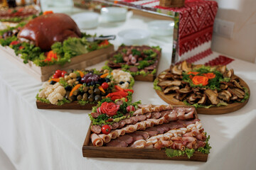 Delicious festive spread featuring diverse dishes and colorful garnishes at a celebratory event