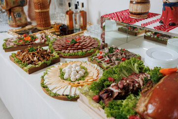 Delicious array of traditional dishes displayed at a festive banquet in a cozy setting