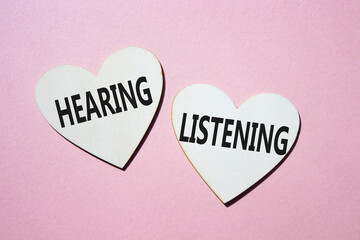 Growth and Stability symbol. Concept word Growth and Stability on wooden hearts. Beautiful pink...