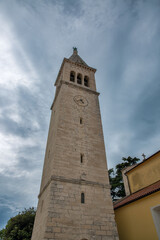 Obraz premium Stone bell tower with clock in Novigrad, Croatia.
