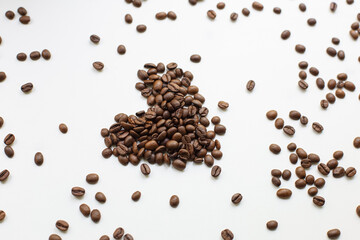 Perfectly roasted coffee beans on a white background. Coffee.