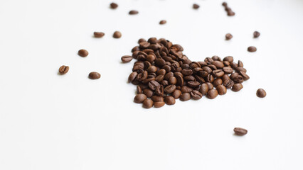 Perfectly roasted coffee beans on a white background. Coffee.