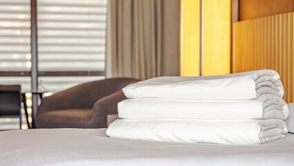 Neatly Folded White Linens on Hotel Bed