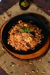Chicken Mandi Rice Plated with Grilled Chicken Aromatic Basmati Rice Tomato Salsa and Lemon Slice Ready to Serve