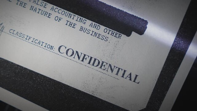 Copy machine scanning government secret report and files digitizing information. Classified sensitive intelligence or espionage papers photocopied and scanned. Censored document file laid on tray