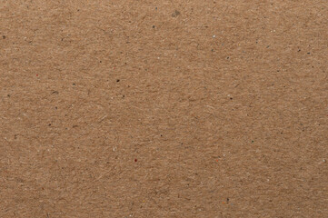 Natural textured paper with warm brown color suitable for crafts and projects
