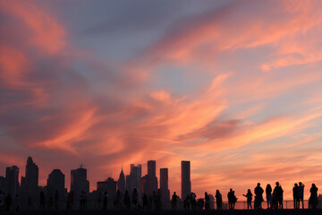 stunning sunset over new york city with skyscrapers silhouetted against vibrant orange and purple hues