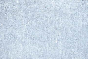 Light grey textured wall background with abstract plaster pattern and rough gray putty