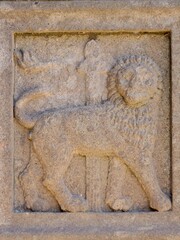 Detail of a stone carving. Palace of the Popes in Viterbo (Palazzo dei Papi di Viterbo) and 'Piazza dei San Lorenzo'. Viterbo, Lazio region, Italy