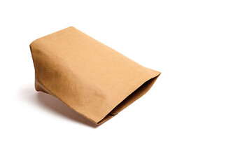 Brown paper bag with a crumpled texture, positioned on a white background, showcasing its unique shape and design, ideal for packaging and branding purposes
