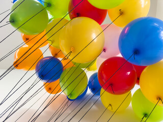 Colorful baloons with black strings © elvis901