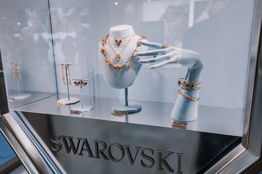 1 June 2025, Belgrade, Serbia: Swarovski necklaces, earrings, rings, and bracelets in a luxurious jewelry store window