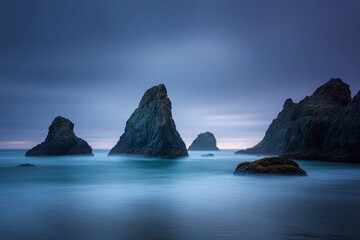 Coastal rocks, tranquil blue hour