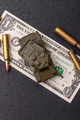 Money, cash dollars to fund weapons for war and defense against attack. Dollars for war