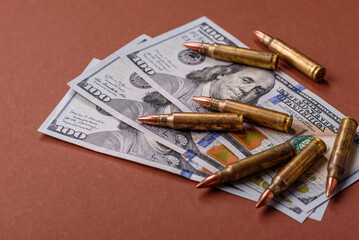Money, cash dollars to fund weapons for war and defense against attack. Dollars for war