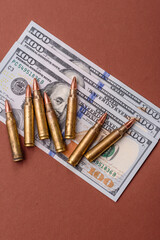 Money, cash dollars to fund weapons for war and defense against attack. Dollars for war