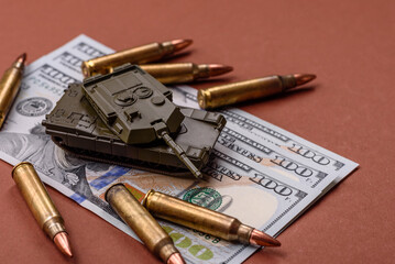 Money, cash dollars to fund weapons for war and defense against attack. Dollars for war