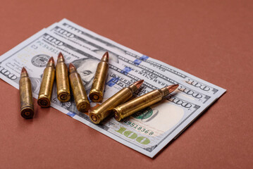 Money, cash dollars to fund weapons for war and defense against attack. Dollars for war