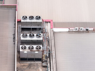 Cooling towers in data center building. Air conditioning cooling towers in front of building with...