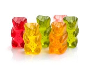 Colorful gummy bears on white background
