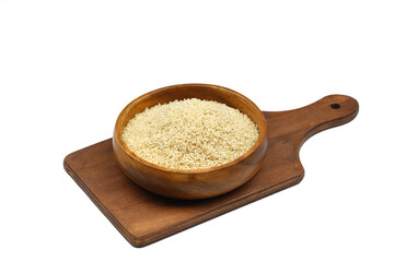 Top view closeup of freshly harvested white sesame in wooden bowl isolated on white background with clipping path.