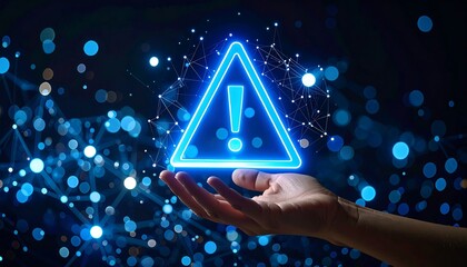 A hand holds a glowing blue exclamation triangle