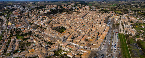 Aerial view of the old town of Pezenas in France on a sunny afternoon in spring.