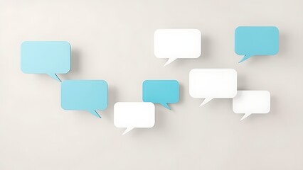 Fototapeta premium Floating speech bubble shapes on a neutral background, representing communication and feedback.