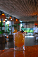 whiskey sour cocktail in a stylish and bohemian restaurant