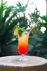 Sex on the beach cocktail drink in a bohemian venue