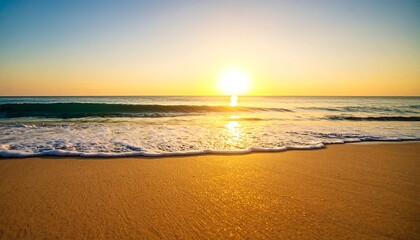 Golden sunset over a tranquil ocean beach